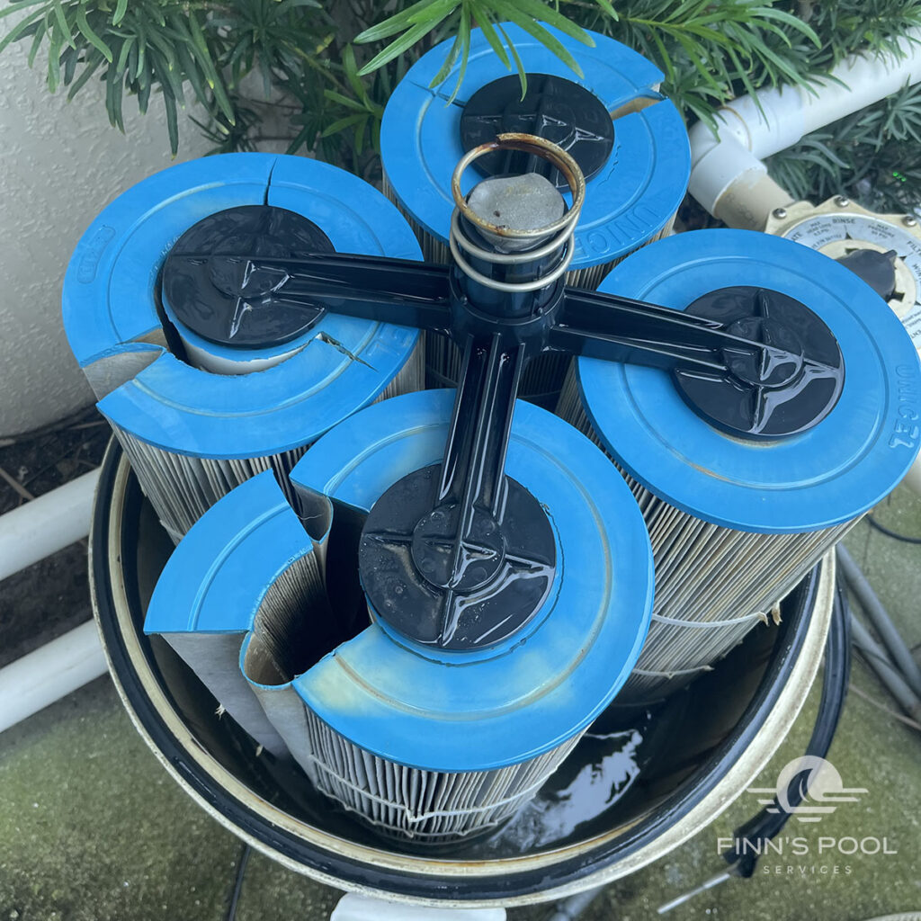 Dirty pool filter cartridges causing cloudy pool water and reduced circulation