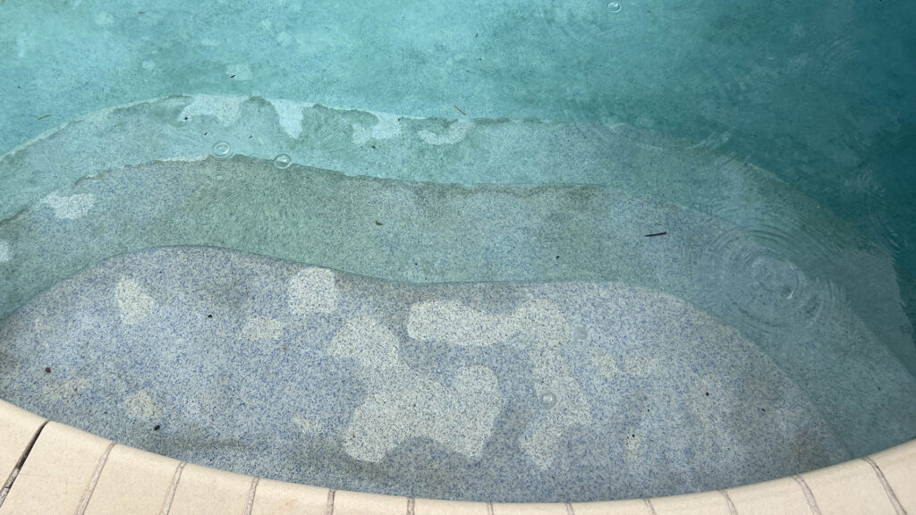Pool stains and discoloration on plaster surface that can pose health and safety risks