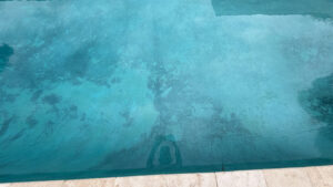 copper stains on plaster surface before treatment to remove copper stains from pool