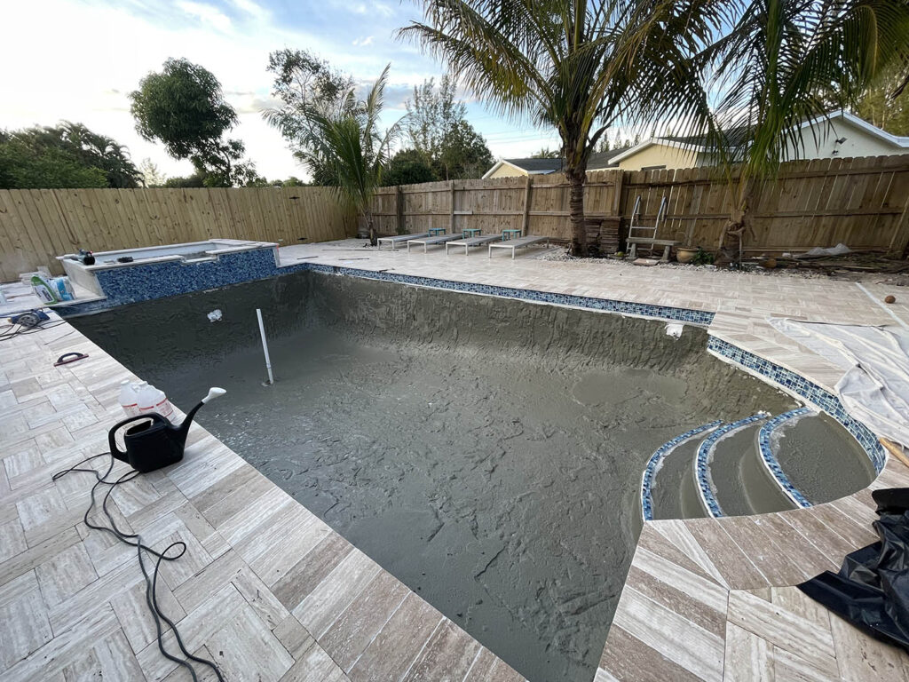 Pool resurfacing in Jupiter FL with fresh plaster finish