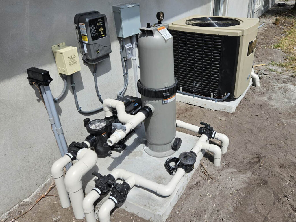 Residential pool pump and filter equipment pad with plumbing layout