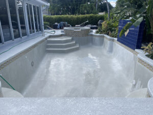 pebble vs plaster pool resurfacing finish