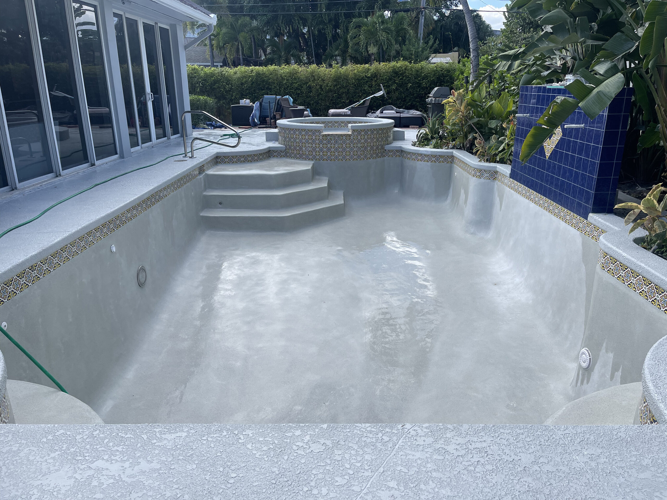 pebble vs plaster pool resurfacing finish
