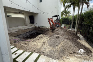 Excavation site for a new backyard pool in Florida – an early step in a homeowner's guide to new pool construction