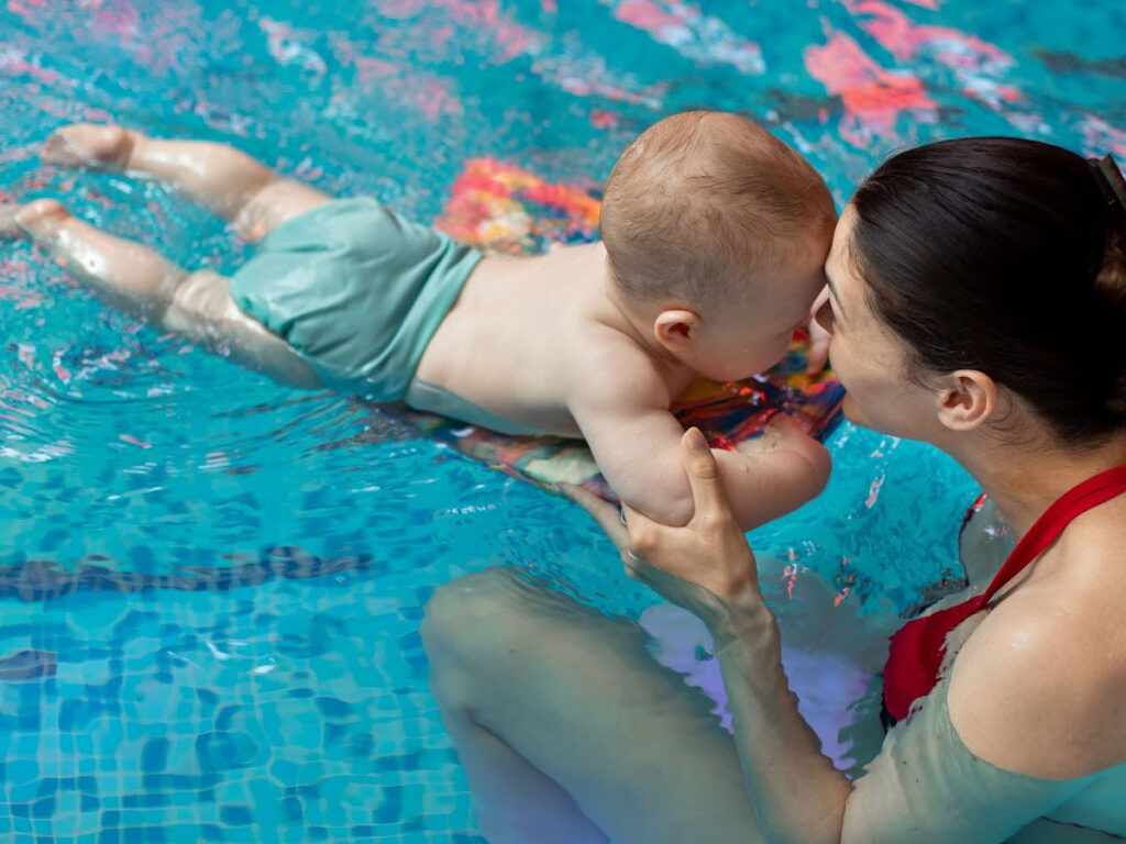 Family enjoying a safe and well maintained swimming pool in West Palm Beach