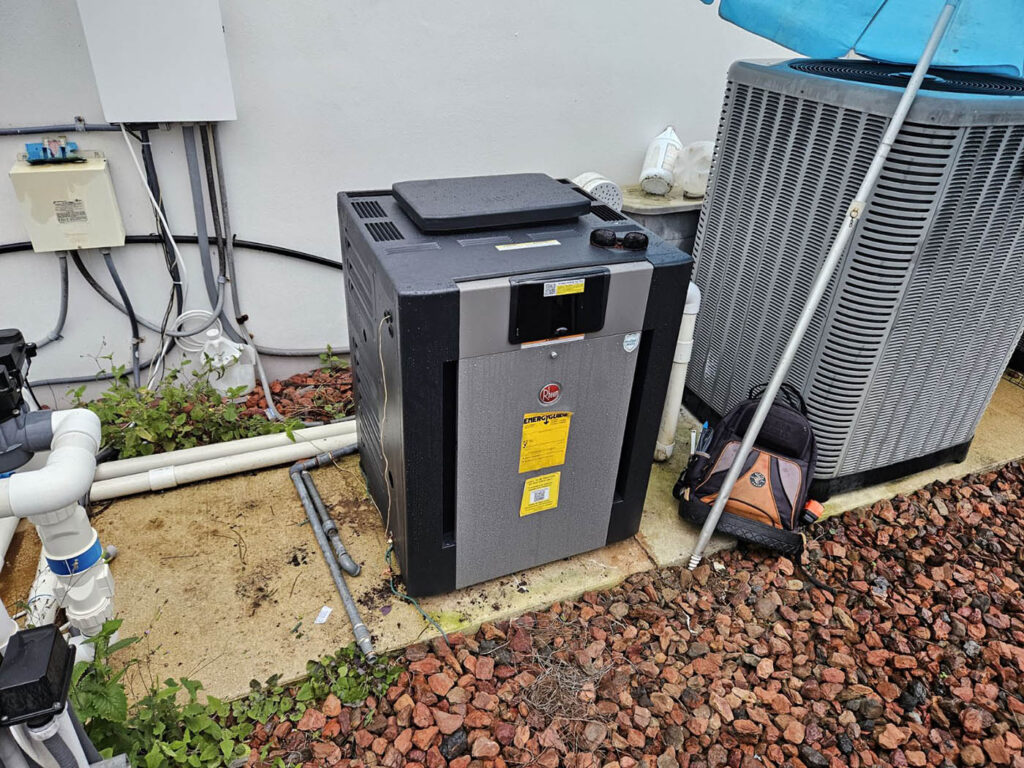 Pool heater repair in Jupiter with pool heater and pump equipment