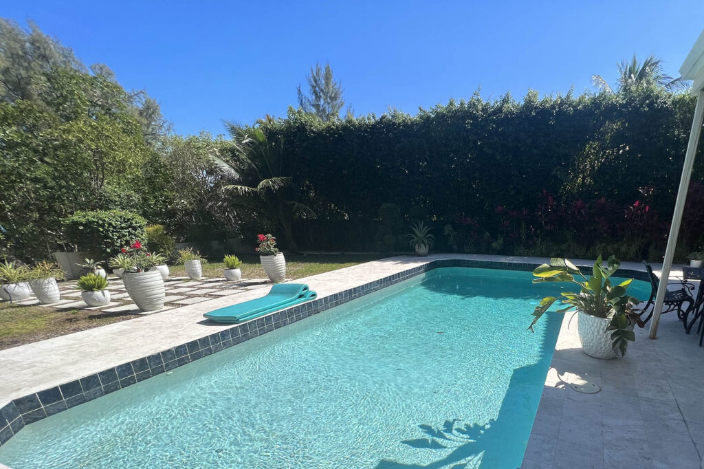 Clean residential pool maintained by a pool maintenance company in West Palm Beach