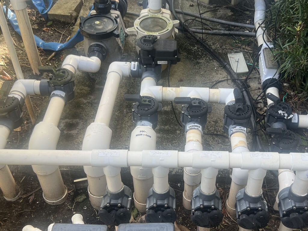 Pool plumbing repair in Jupiter with valves and pool circulation lines