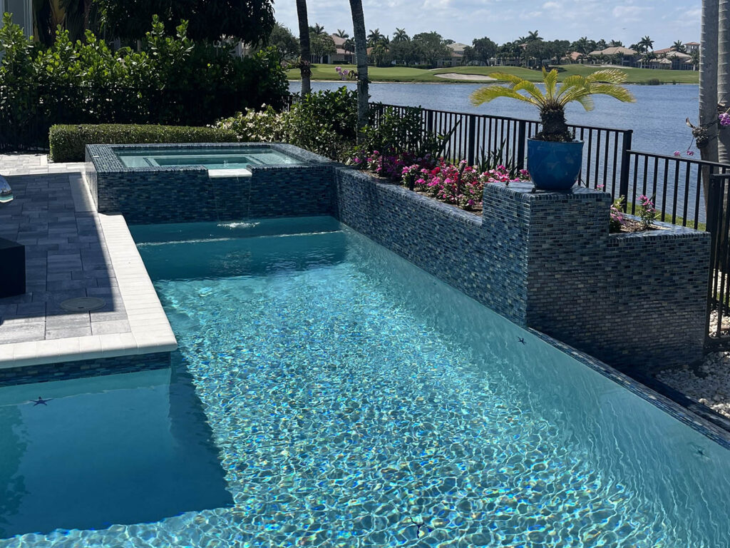 Modern pool remodeling project in Jupiter FL with upgraded spa and finishes