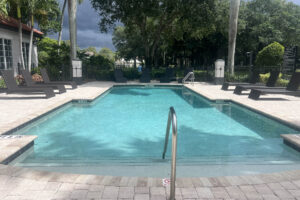 Community swimming pool in West Palm Beach operating year round in Florida heat