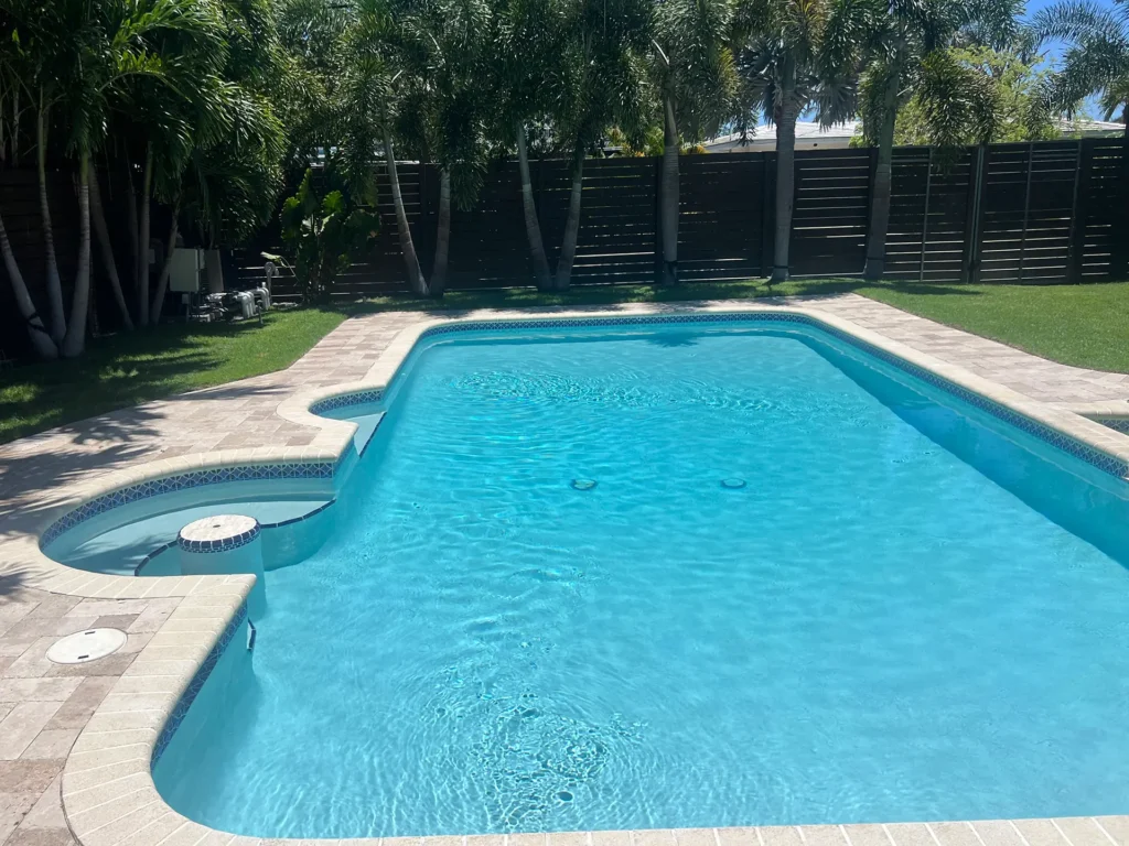 Recently resurfaced pool showing results that explain why pool resurfacing quotes vary.